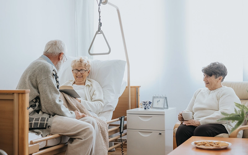 woman in a hospital bed at home